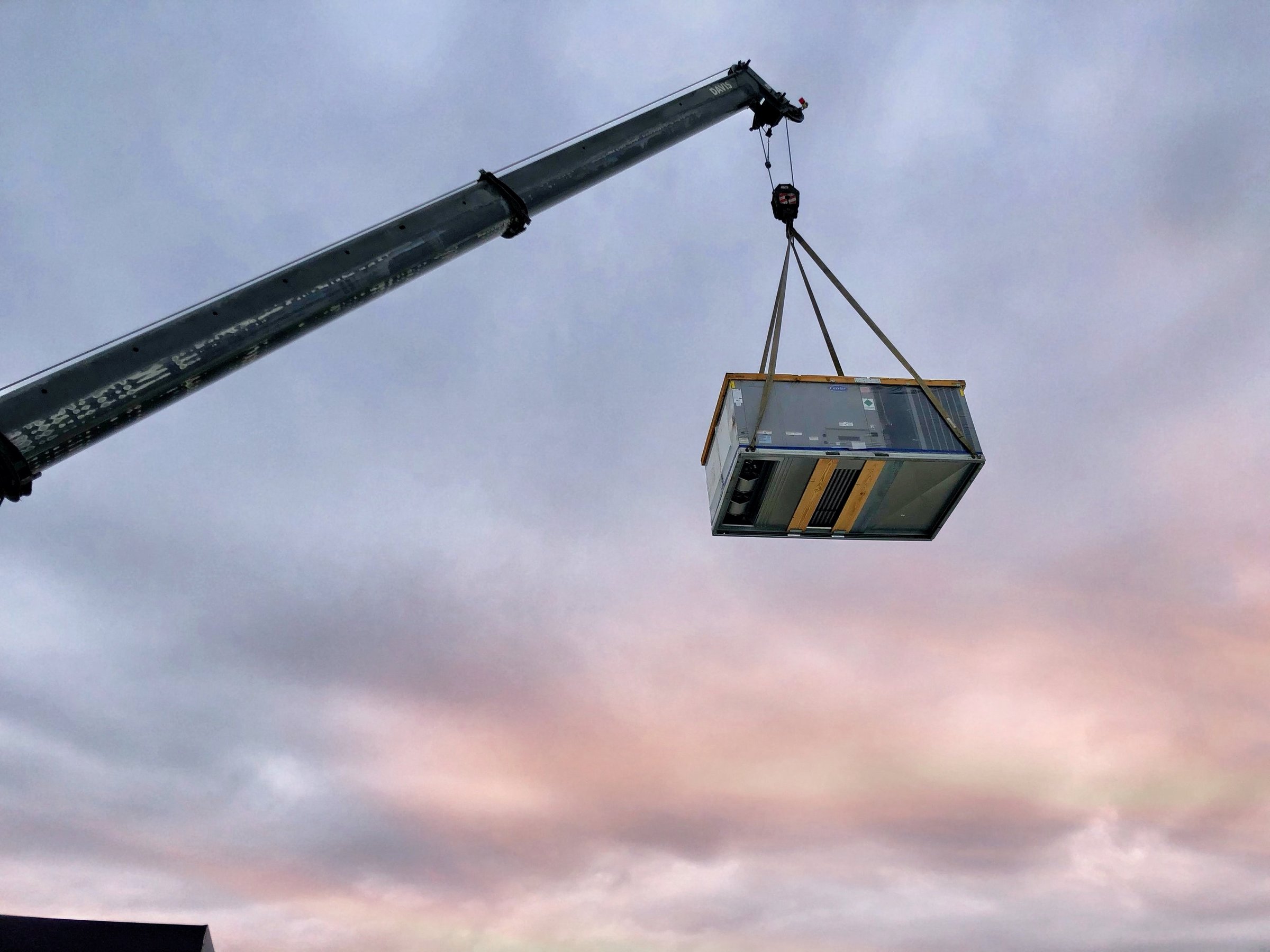 Commercial HVAC crane installation